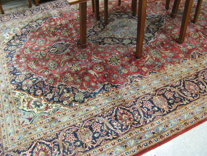 Appraisal: PERSIAN NAJAFABAD CARPET floral and central floral medallion design on