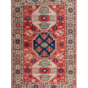 Appraisal: A Turkish Wool Rug Mid- th Century feet inches x