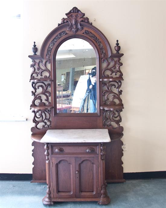 Appraisal: Unusual Walnut Rococo Revival Marble-top Stand Etagere having a cabinet