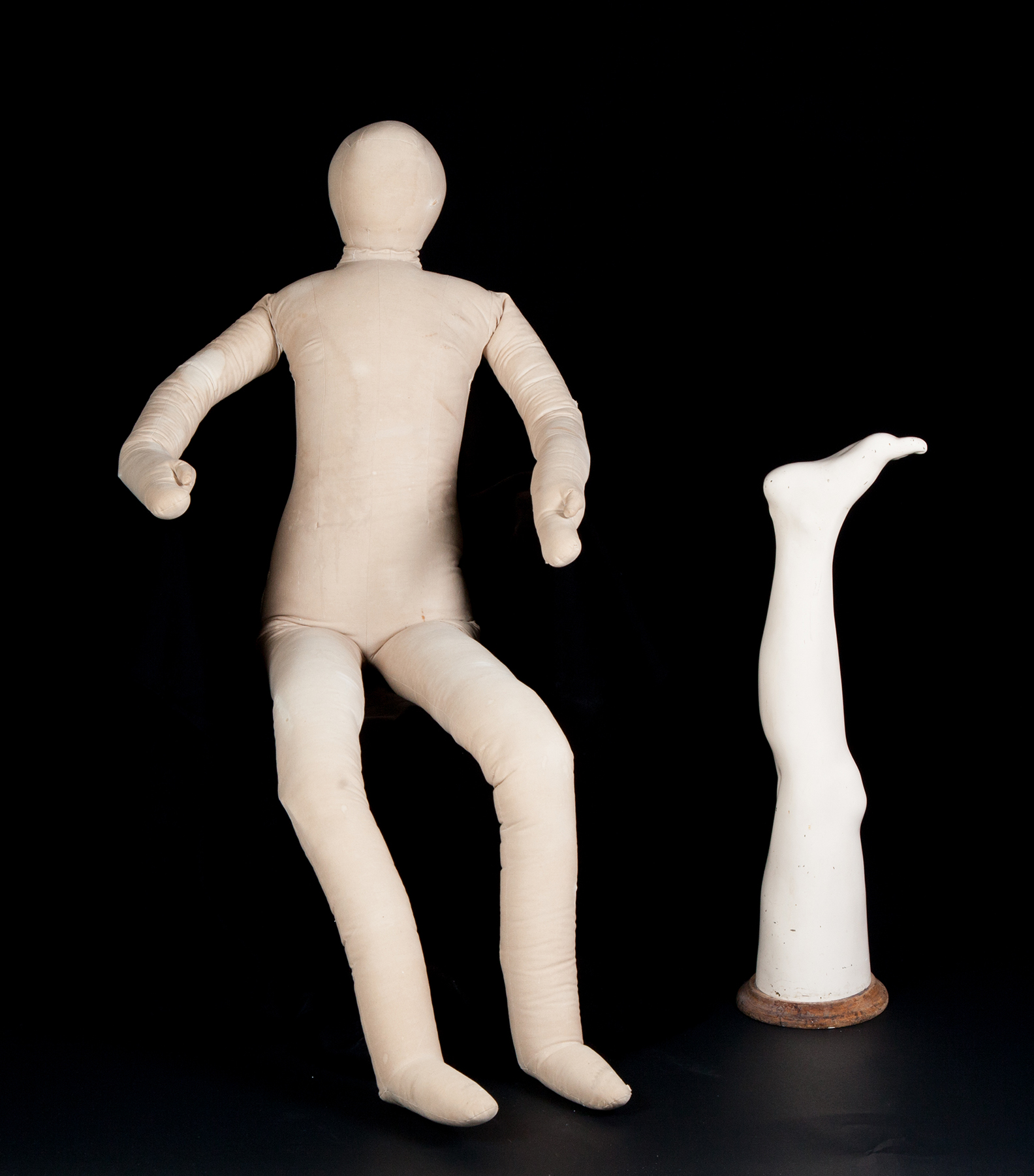 Appraisal: AMERICAN MANNEQUIN AND LEG Twentieth century Life-size featureless stuffed cloth