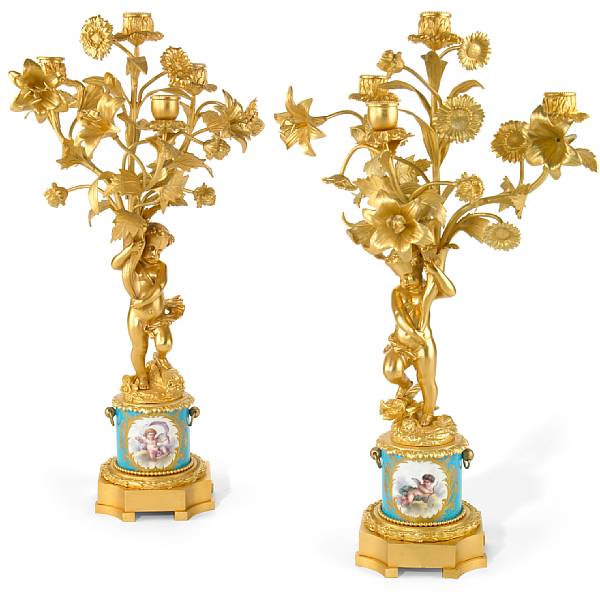 Appraisal: A pair of Louis XVI style gilt bronze mounted porcelain