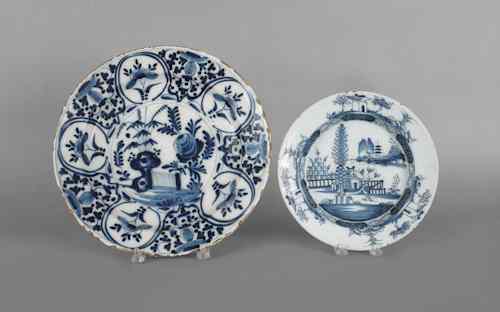 Appraisal: Two Delft blue and white chargers th c dia and