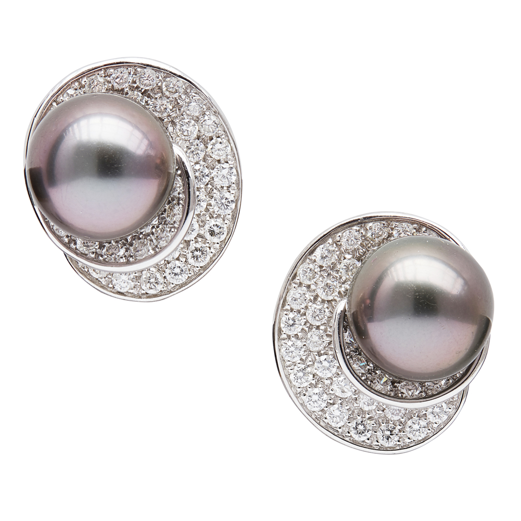 Appraisal: A pair of pearl and diamond set earringseach set with