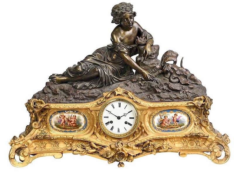 Appraisal: Gilt Bronze Mantle Clock With Reclining Figure Continental th century