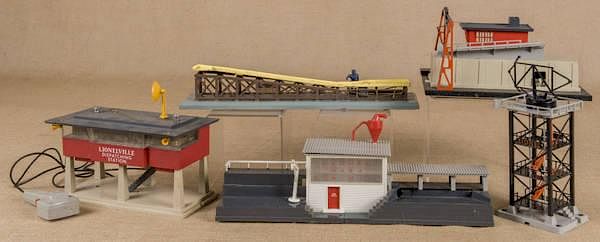 Appraisal: Five Lionelville plastic train accessories to in Five Lionelville plastic