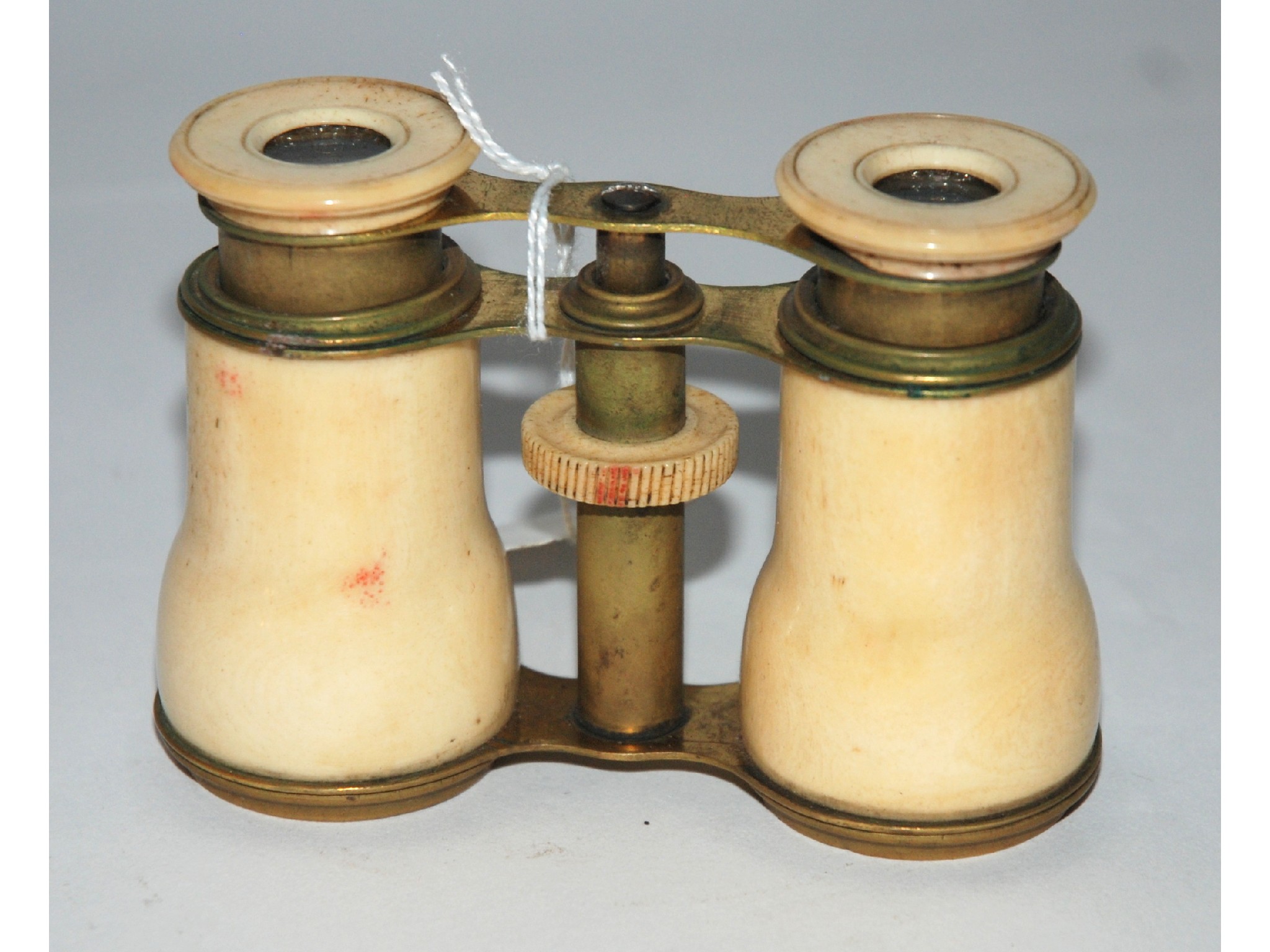 Appraisal: A pair of ivory opera glasses in case