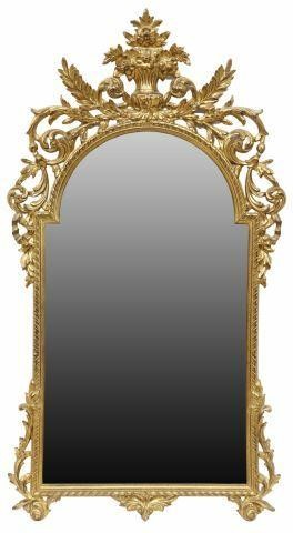 Appraisal: Florentine giltwood wall mirror th c having floral bouquet crest