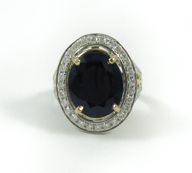 Appraisal: SAPPHIRE DIAMOND AND FOURTEEN KARAT GOLD RING The k white