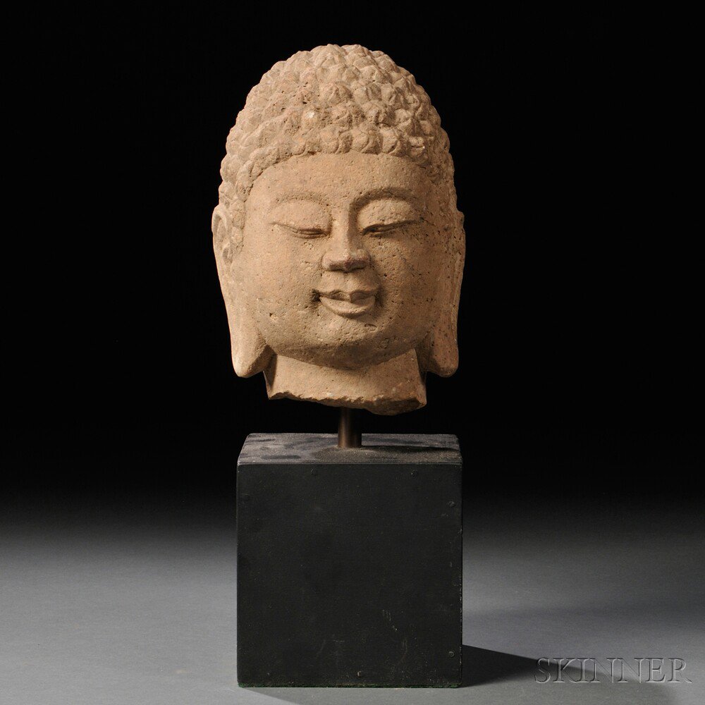 Appraisal: Stone Buddha Head China Ming Dynasty style with a wood