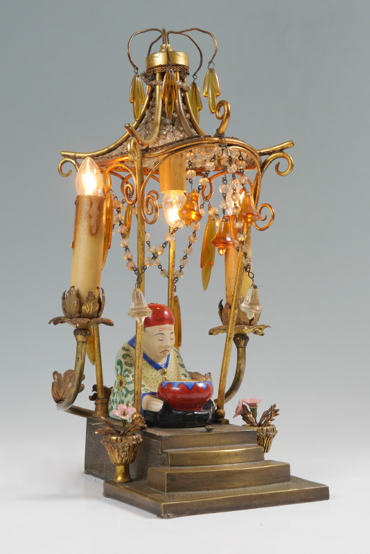 Appraisal: FRENCH PAGODA LAMP WITH SEATED FIGURE IN CENTER Brass pagoda