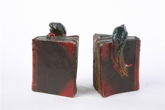 Appraisal: TWO PARROT BOOKENDS Hollow metal bookends with a parrot and