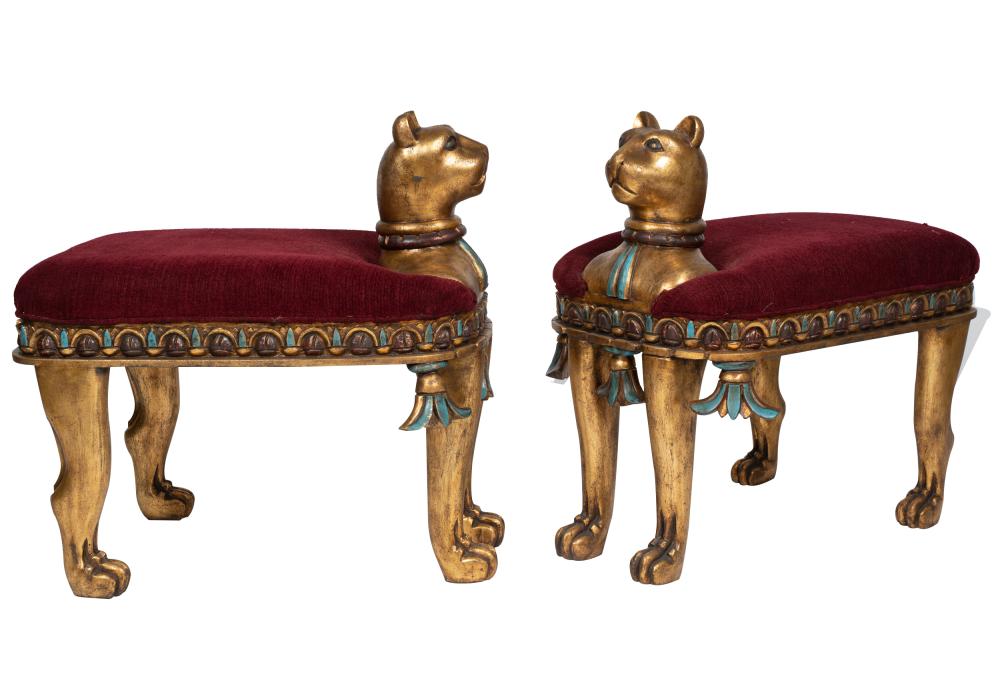 Appraisal: PAIR OF EGYPTIAN REVIVAL GILT PAINTED WOOD STOOLScovered with maroon