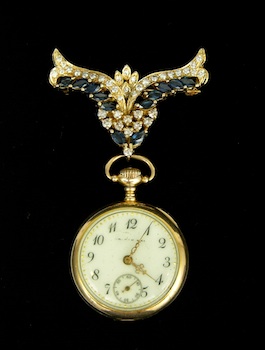 Appraisal: A Diamond and Sapphire Watch Pin with a Waltham Pocket