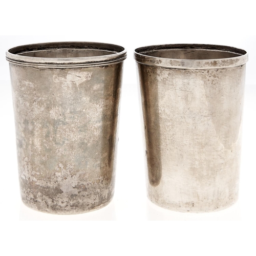 Appraisal: Two Indian colonial silver beakers plain or moulded rim cm