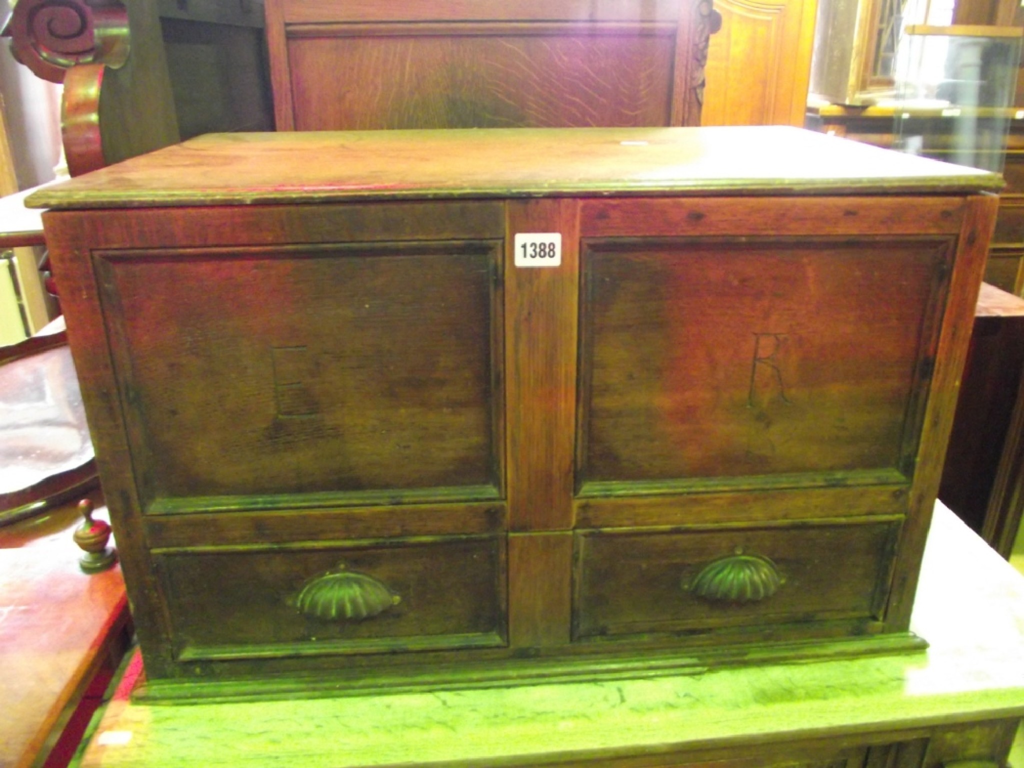 Appraisal: A th century continental walnut two tier buffet enclosed by