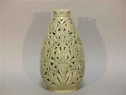 Appraisal: CHEREMIL CELADON-GLAZED RETICULATED ARTS AND CRAFTS VASE Sealed R Cheremil