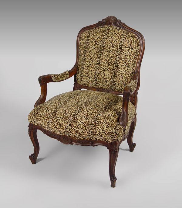 Appraisal: CARVED LOUIS XV STYLE FRENCH FAUTEUIL Natural finish carved walnut