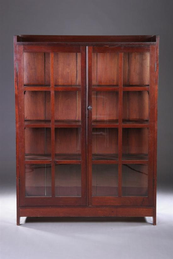 Appraisal: AMERICAN MISSION MAHOGANY GLAZED-DOOR BOOKCASE early th century Quarter galleried