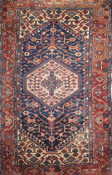 Appraisal: AN ANTIQUE DARK BLUE GROUND HAMADAN RUG approximately cm x