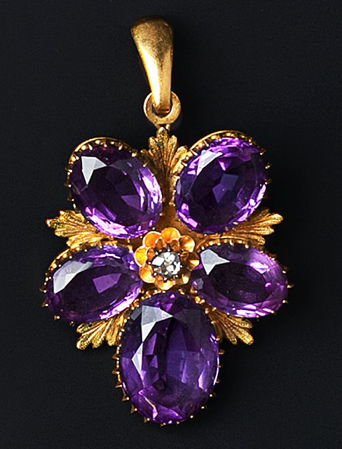 Appraisal: A VICTORIAN AMETHYST AND DIAMOND SET PENDANT BROOCH modelled as