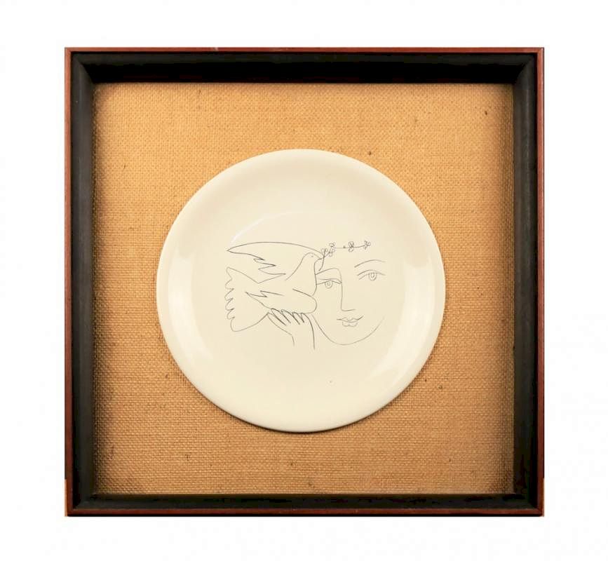 Appraisal: A Picasso Ceramic Charger for Salins-Woman and Dove glazed ceramic