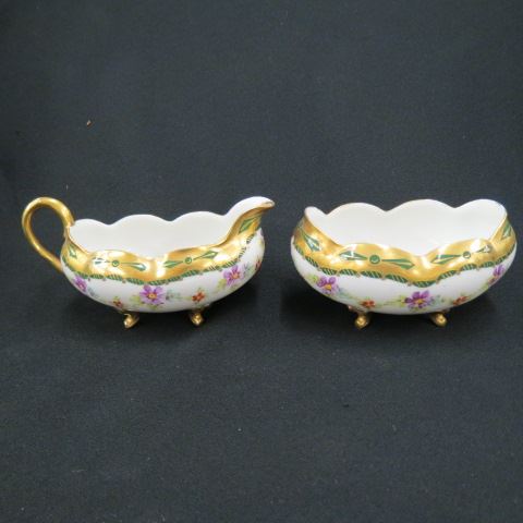 Appraisal: Handpainted Limoges Porcelain Creamer and Sugar footed gold trim