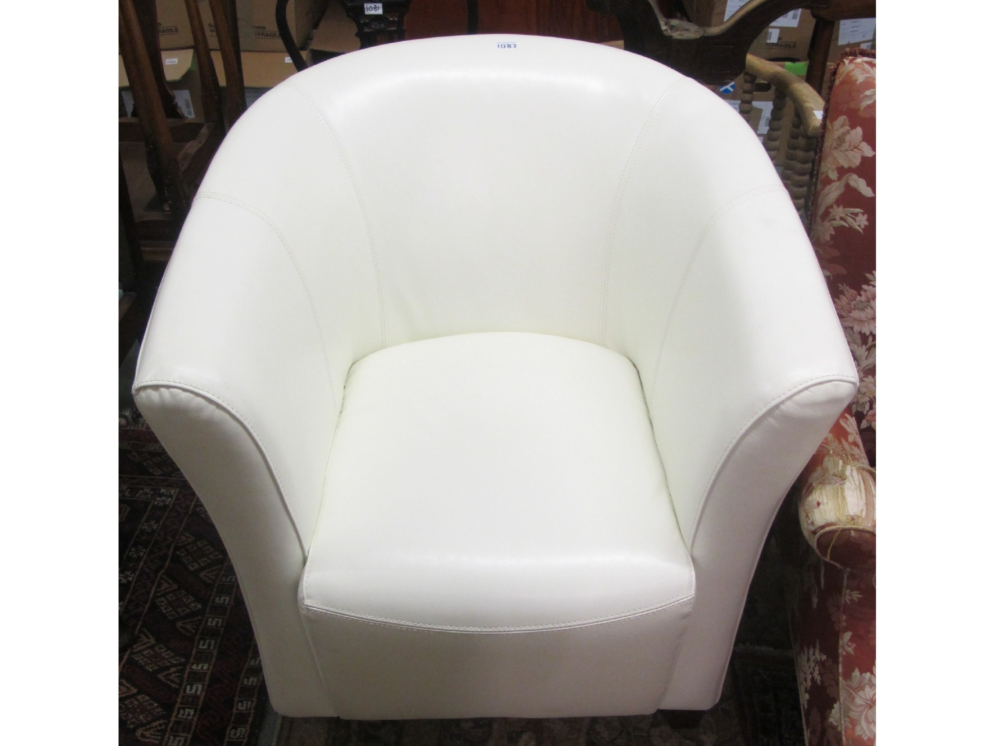 Appraisal: A white leather tub chair