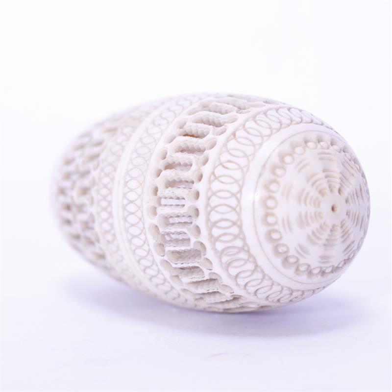 Appraisal: Carved reticulated Egg-shaped Ivory Sewing accessory Threaded case screws together