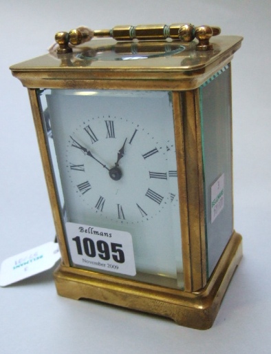 Appraisal: A brass cased carriage clock timepiece the enamelled dial with