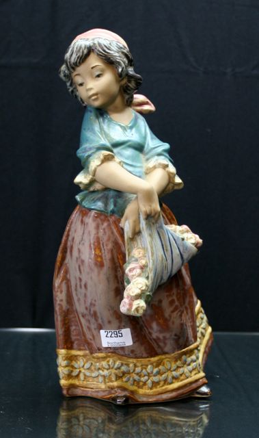 Appraisal: A Lladro figure of a flower girl cm high