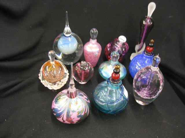 Appraisal: Collection of Art Glass Perfume Bottles includes iridescent cranberry amethyst