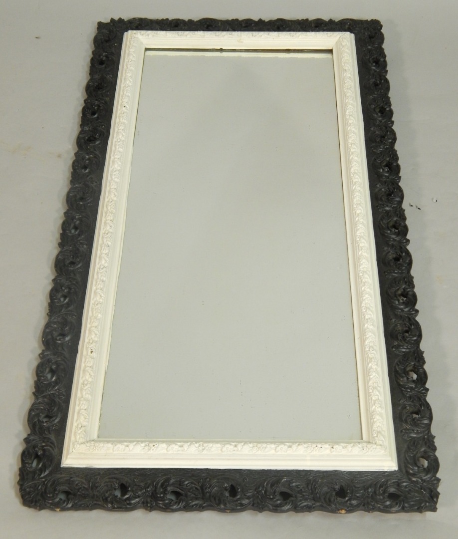 Appraisal: A late thC gilt gesso rectangular wall mirror with a