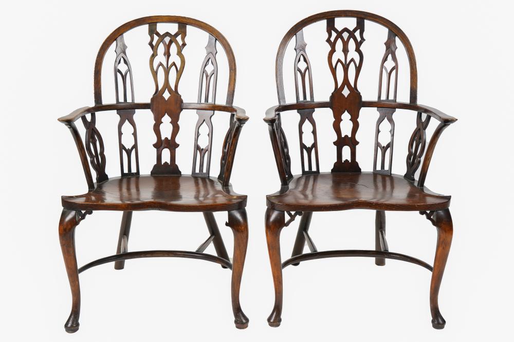 Appraisal: PAIR OF ENGLISH OAK WINDSOR ARMCHAIRSwith manufacturer's label F Parker