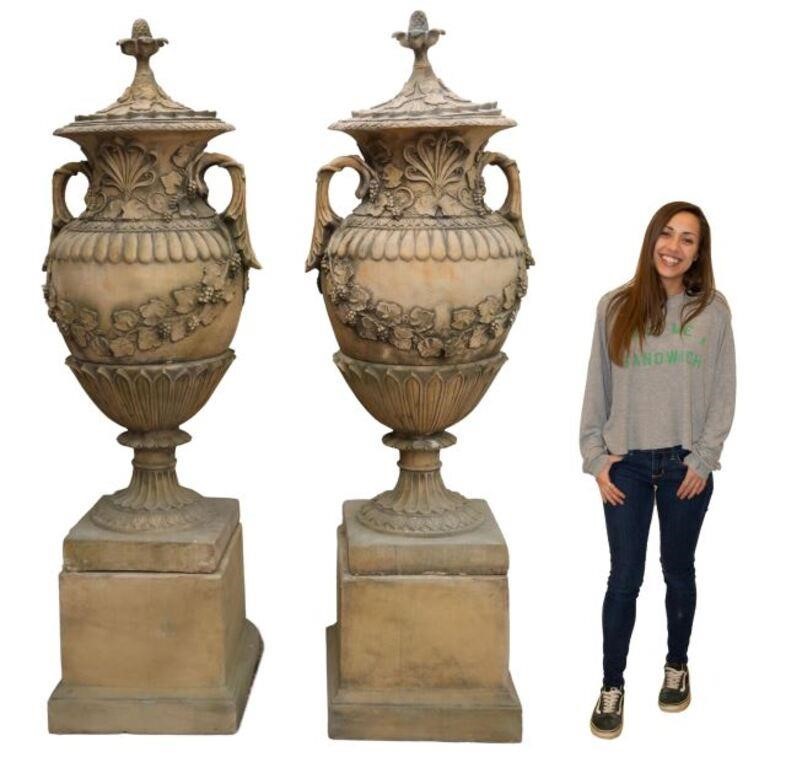 Appraisal: pair Monumental cast stone lidded garden urns th c in