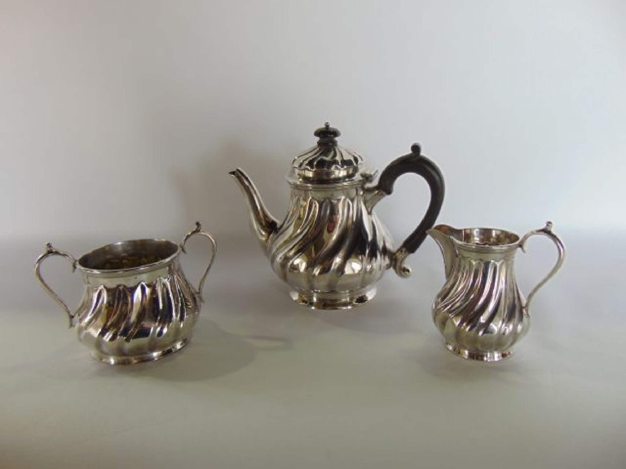 Appraisal: A Victorian silver three-piece tea set Henry Stratford Sheffield -