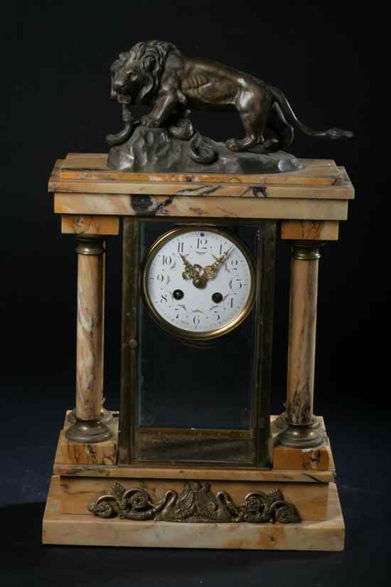 Appraisal: BRONZE MOUNTED OCHRE COLOR MARBLE ARCHITECTURAL MANTLE CLOCK Bronze figure