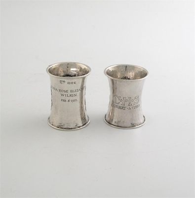 Appraisal: By Omar Ramsden and Alwyn Carr A waisted napkin ring