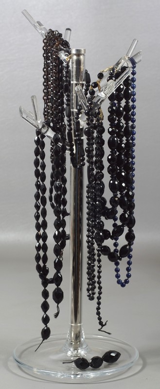 Appraisal: Jet black beaded necklaces with a lapis beaded necklace longest