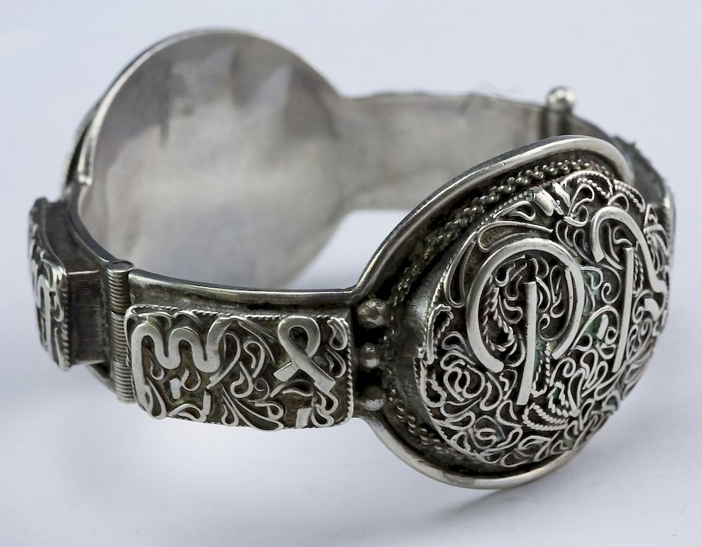 Appraisal: Middle Eastern Arabic Sterling Silver Hinged Cuff Arabic fine wire