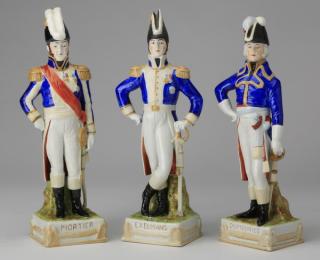 Appraisal: German porcelain soldier figurines Group of three similar early th