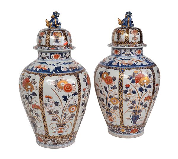 Appraisal: A JAPANESE PAIR OF TALL IMARI VASES AND COVERS with