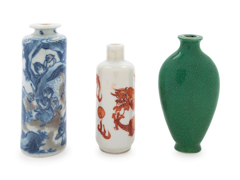 Appraisal: Three Porcelain Snuff Bottles Largest in cm Three Porcelain Snuff