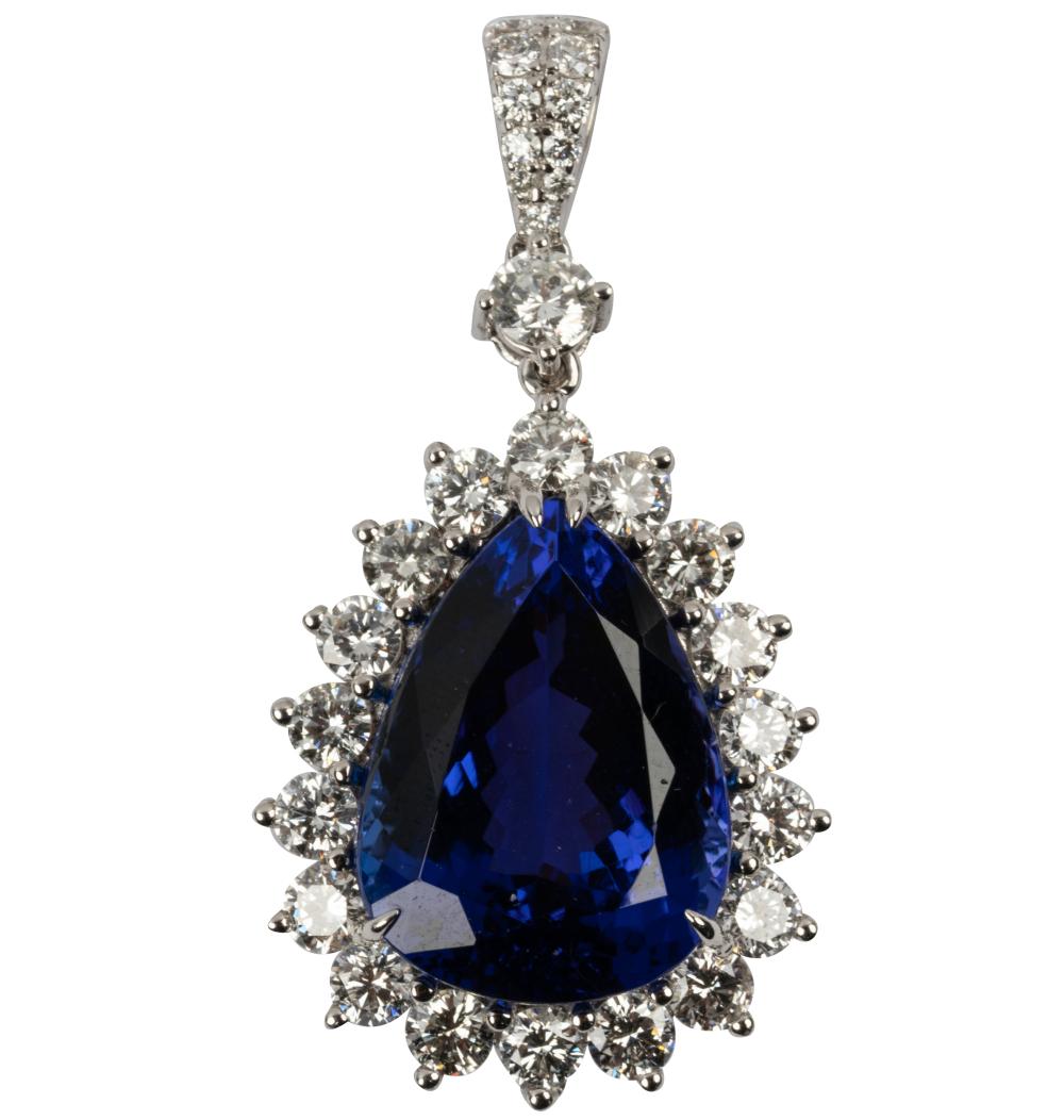 Appraisal: KARAT WHITE GOLD DIAMOND TANZANITE PENDANTcentering one pear mixed cut