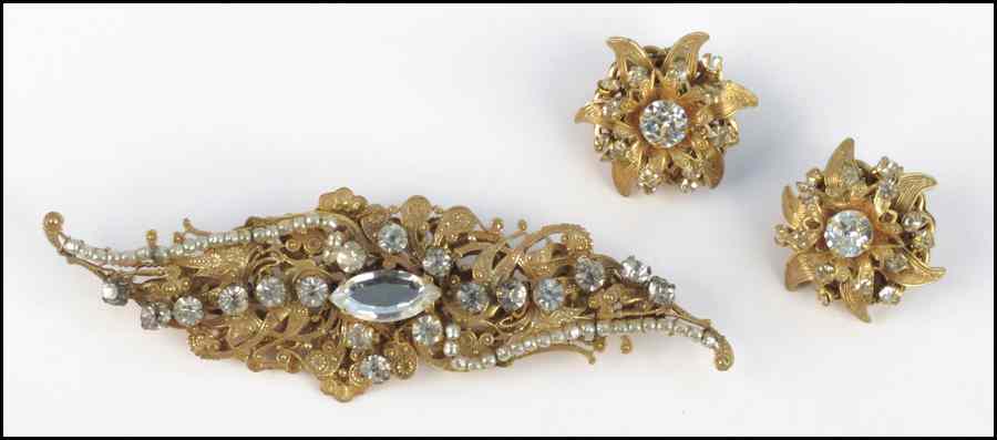 Appraisal: PAIR OF MIRIAM HASKELL RHINESTONE FLORAL EARCLIPS Together with a