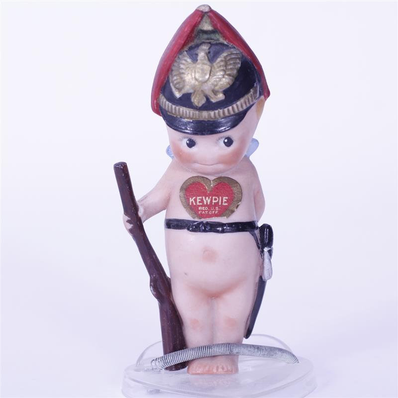 Appraisal: Rose O'Neill German Bisque Kewpie Doll Prussian Soldier figure Red