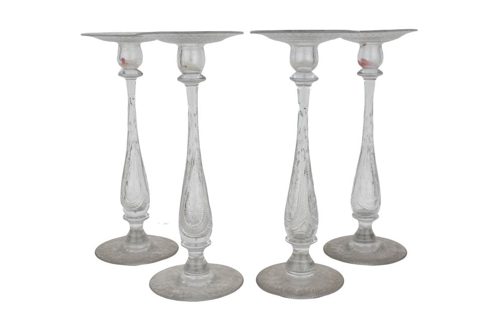 Appraisal: FOUR PAIRPOINT ETCHED GLASS CANDLESTICKSCondition one with chip to upper