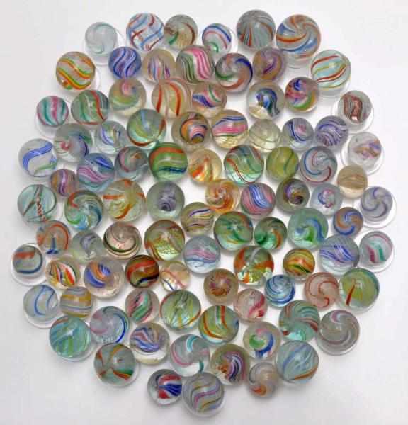 Appraisal: Lot of Swirl Marbles Description Includes white yellow orange latticino