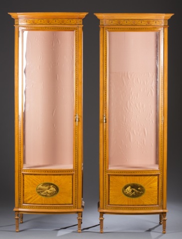 Appraisal: Pair of Edwardian Inlaid Bowfront Vitrines Satinwood veneer with painted