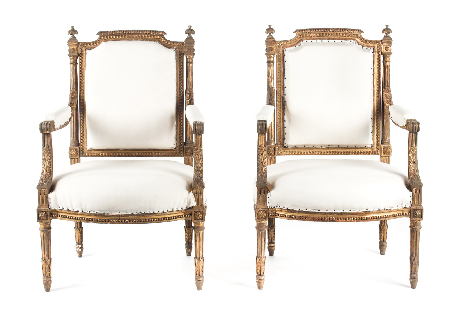 Appraisal: Pair of Louis XVI style gilded wood fauetuils th century