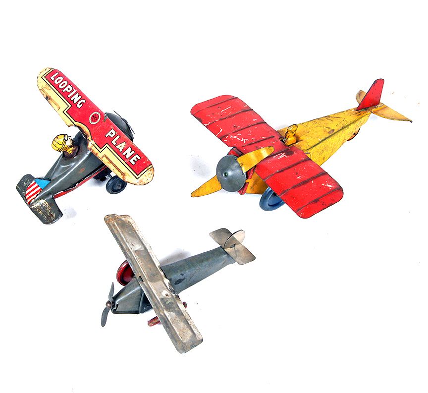 Appraisal: Three Toy Airplanes A group of three tin planes with